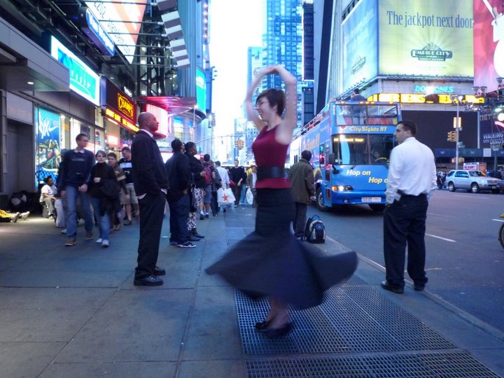 Tove Hermanson twirling in Times Square.