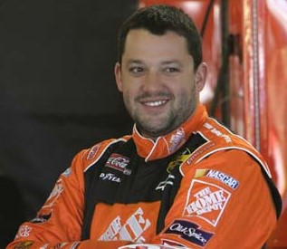 NASCAR driver Tony Stewart sporting his (also orange) sponsor's logo