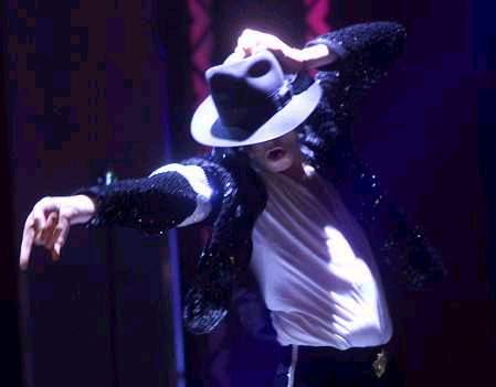 Michael Jackson in white undershirt and fedora